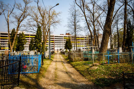 MINSK, BELARUS - 1 MAY, 2019: abandoned Orthodox cemetery in sunny spring weatherのeditorial素材
