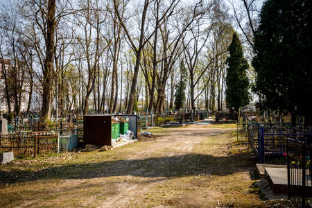 MINSK, BELARUS - 1 MAY, 2019: abandoned Orthodox cemetery in sunny spring weatherのeditorial素材