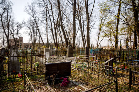 MINSK, BELARUS - 1 MAY, 2019: abandoned Orthodox cemetery in sunny spring weatherのeditorial素材