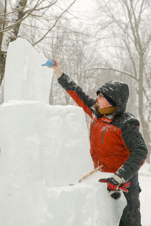 MINSK, BELARUS - 1 March, 2022: artist creates ice sculptureのeditorial素材