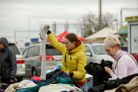 MINSK, BELARUS - 1 March, 2022: huge market for used clothes on the streetのeditorial素材