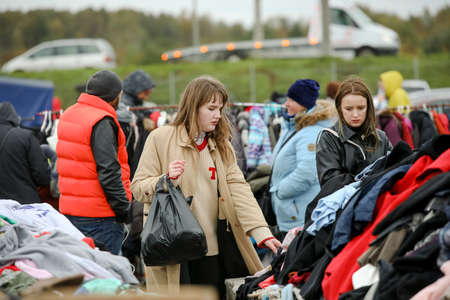 MINSK, BELARUS - 1 March, 2022: huge market for used clothes on the streetのeditorial素材