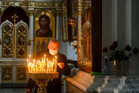 MINSK, BELARUS - 1 March, 2022: Orthodox came to church to pray for Sunday serviceのeditorial素材