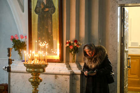 MINSK, BELARUS - 1 March, 2022: Orthodox came to church to pray for Sunday serviceのeditorial素材