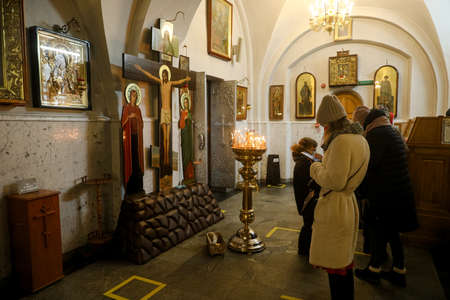 MINSK, BELARUS - 1 March, 2022: Orthodox came to church to pray for Sunday serviceのeditorial素材