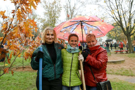 MINSK, BELARUS - 1 March, 2022: people plant trees in their yardのeditorial素材