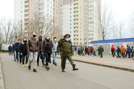 MINSK, BELARUS - 1 March, 2022: sending young soldiers to the Belarusian troops for the war in Ukraineのeditorial素材