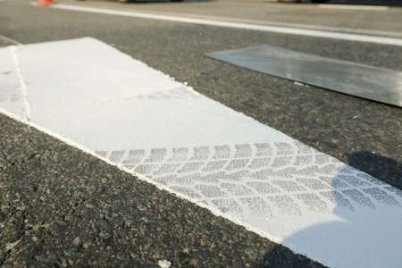 MINSK, BELARUS - 18 FEBRUARY, 2022: workers apply road markings on the road