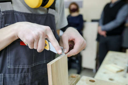 MINSK, BELARUS - 18 FEBRUARY, 2022: young people study in the college of the working professionの写真素材