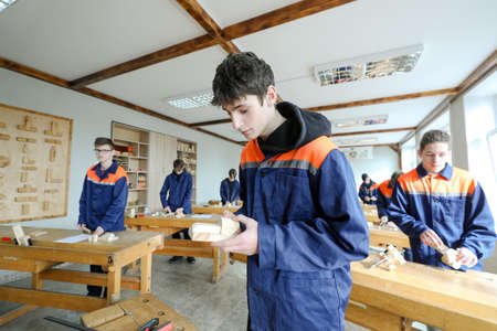 MINSK, BELARUS - 18 FEBRUARY, 2022: young people study in the college of the working professionのeditorial素材