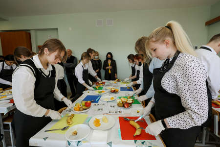 MINSK, BELARUS - 18 FEBRUARY, 2022: young people study in the college of the working professionのeditorial素材