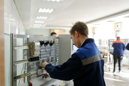 MINSK, BELARUS - 18 FEBRUARY, 2022: young people study in the college of the working professionのeditorial素材