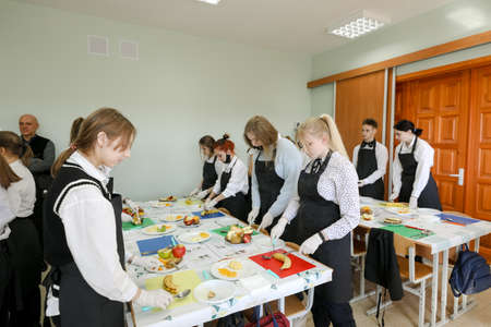 MINSK, BELARUS - 18 FEBRUARY, 2022: young people study in the college of the working professionのeditorial素材