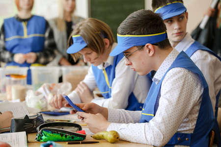 MINSK, BELARUS - 18 FEBRUARY, 2022: young people study in the college of the working professionのeditorial素材