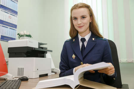 MINSK, BELARUS - 18 FEBRUARY, 2022: young woman prosecutorのeditorial素材