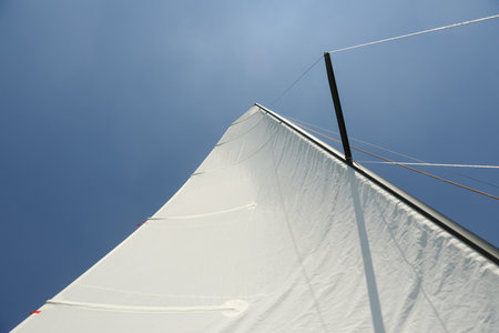 MINSK, BELARUS - 22 July, 2022: girl is sailing on a boatの写真素材