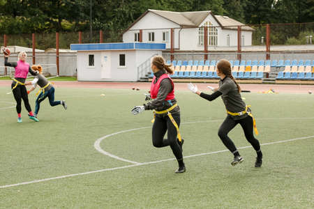 MINSK, BELARUS - 22 July, 2022: girls train to play flag footballの写真素材