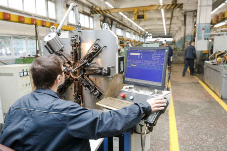 MINSK, BELARUS - 22 July, 2022: people with hearing disabilities work in a factory