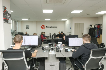 MINSK, BELARUS - 9 SEPTEMBER, 2022: managers work in used car sales officeの写真素材