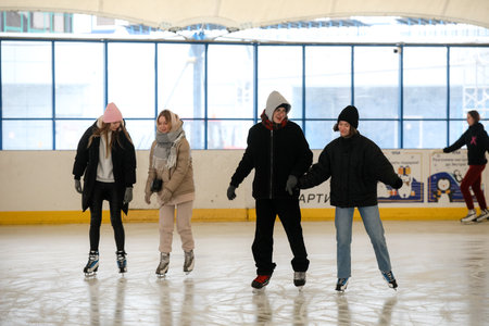MINSK, BELARUS - 9 SEPTEMBER, 2022: people skating on the rinkの写真素材