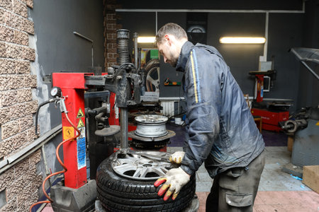 MINSK, BELARUS - 9 SEPTEMBER, 2022: tire fittingの写真素材