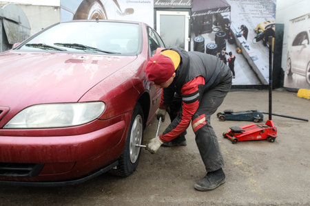 MINSK, BELARUS - 9 SEPTEMBER, 2022: tire fittingの写真素材