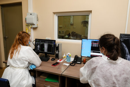 MINSK, BELARUS - 9 SEPTEMBER, 2022: doctor takes a patient in the hospitalの写真素材