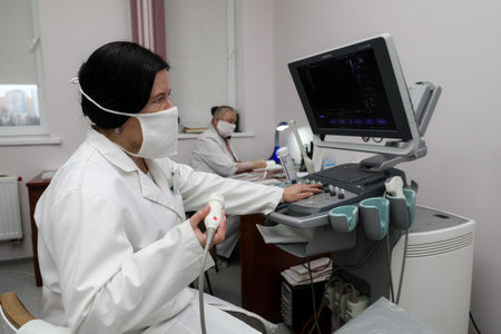 MINSK, BELARUS - 9 SEPTEMBER, 2022: doctor takes a patient in the hospitalの写真素材