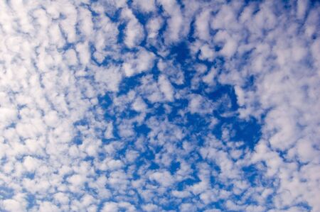 White clouds on blue sky