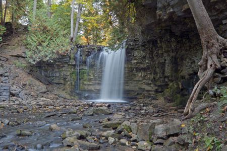 Waterfall on small forest river in Ontario.の写真素材