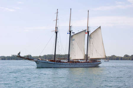 Tree masts sail ship on Ontario lakeの写真素材
