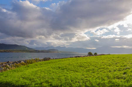 Sunlit Norway landscape at fall time