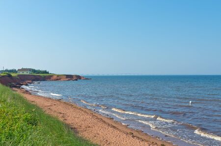 Red sand beach at  Prince Edward Island, Canadaの写真素材
