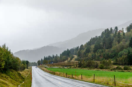 Mountain road in Norway at fall timeの写真素材
