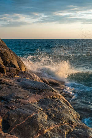 Sunset over surf of the Superior Lake. Canadaの写真素材