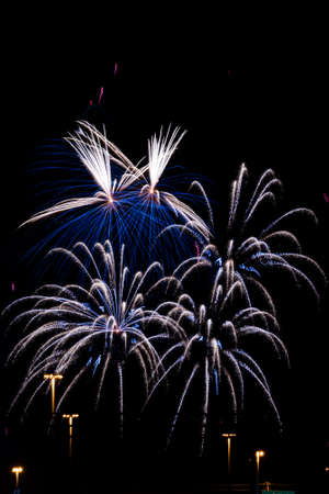 Color fireworks on black sky background