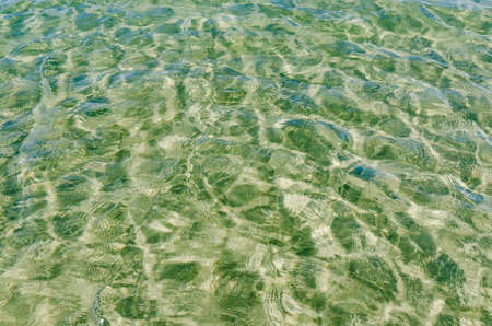 Light, shadow and clear water at shore of Georgian Bay Ontario