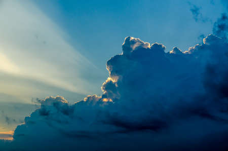 Sunlit whine and gray clouds on blu sky.の写真素材