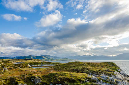 Sunlit Norway landscape at fall time