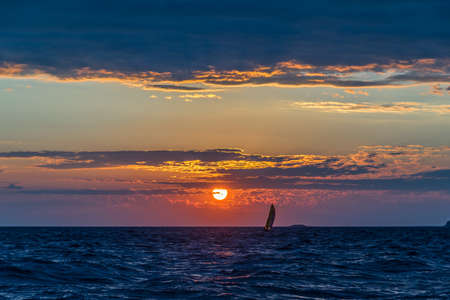 Sunset over surface of the Superior Lake. Canadaの写真素材