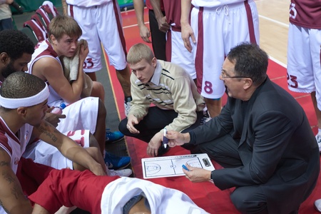 SAMARA, RUSSIA - NOVEMBER 27: Coach of BC Krasnye Krylia Stanislav Eremin says the game plan November 27, 2010 in Samara, Russia.のeditorial素材