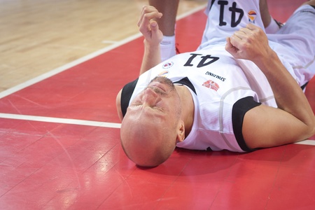 SAMARA, RUSSIA - NOVEMBER 02: Dmitry Domani of BC Krasnye Krylia is on the floor after a foul in a...