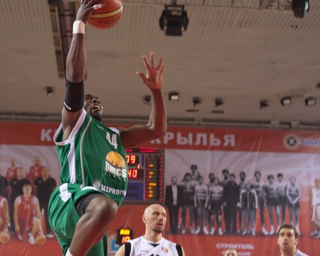 SAMARA, RUSSIA - MARCH 10: Henry Domercant of BC UNICS, with ball, is on the attack during a  BC Krasnye Krylia game on March 10, 2012 in Samara, Russia.のeditorial素材