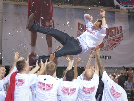 SAMARA, RUSSIA - MAY 12: The players of BC Krasnye Krylia celebrates his coach after winning the Cup of Russia on May 12, 2012 in Samara, Russia.のeditorial素材