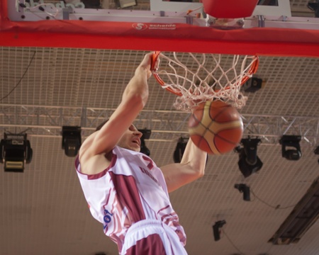SAMARA, RUSSIA - DECEMBER 02: Victor Zaryazhko of BC Krasnye Krylia makes slam dunk in the game...