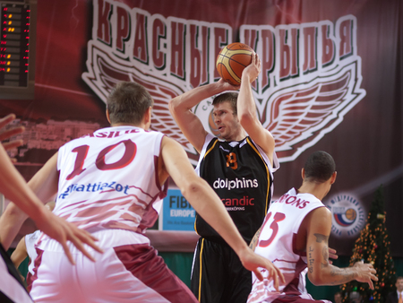 SAMARA, RUSSIA - JANUARY 15: Anton Saks of BC Norrkoping Dolphins, with ball, is on the attack during a BC Krasnye Krylia game on January 15, 2012 in Samara, Russia.のeditorial素材