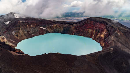 Kamchatka. Maly Semyachik volcano crater with acid lake