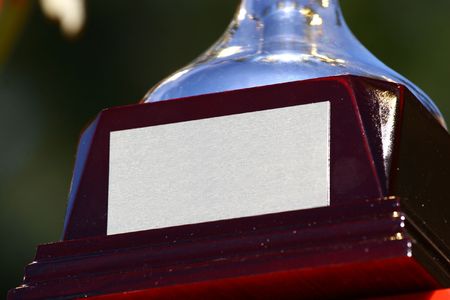 Golden plate for sign on a bottom of cupの写真素材