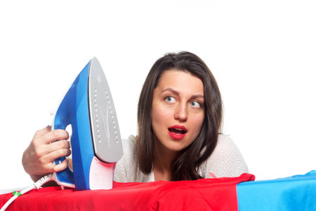 Ironing woman, isolated on whiteの写真素材