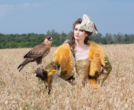 Woman with howk on hand